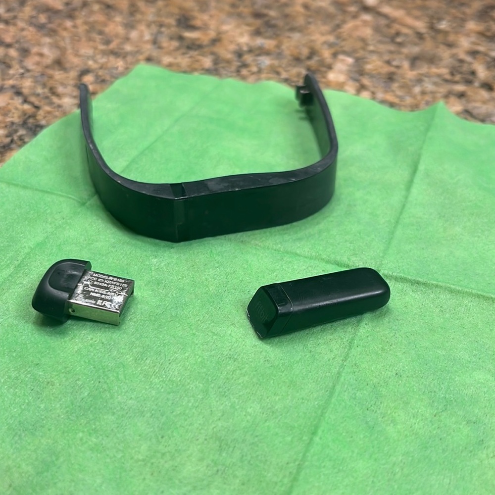 Fitbit Purchased but used twice Cleaning things out so my loss is your gain. SM